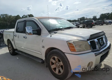 2004 Nissan Titan Xe z USA, uszkodzony, nr VIN 1N6AA07AX4N569962